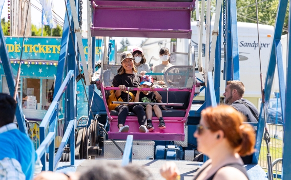 Mother and child on ferris wheel